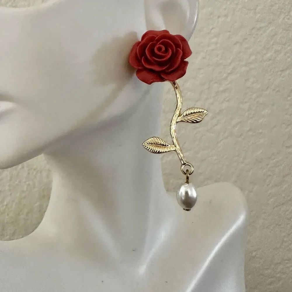 Rose gold tone pearl earrings